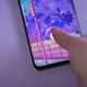 A photo of a person using the fingerprint unlock on the OnePlus 10 Pro